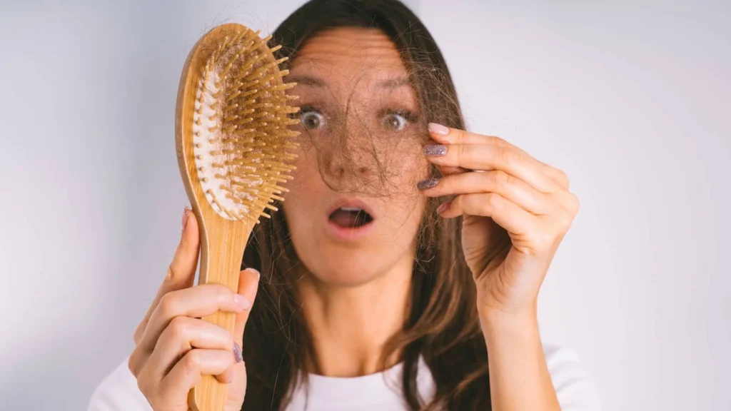 como reducir la caida del cabello en mujeres